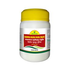 White container with yellow lid, labeled in red and green text.